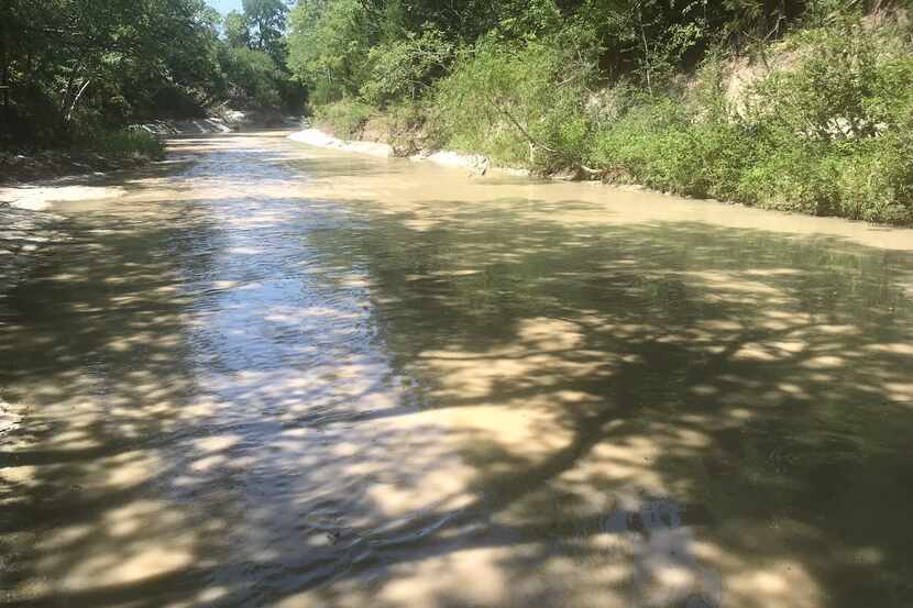 Sewage flowed into Cottonwood Creek near Chaparral Road in Plano on Tuesday due to a leak at...