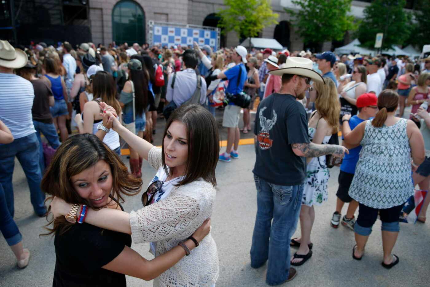 Fans dance to a performance by Dylan Scott during the Academy of Country Music Party for a...