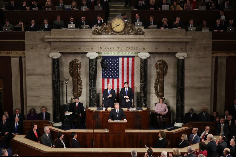 U.S. President Donald Trump addresses a joint session of the U.S. Congress as Vice President...