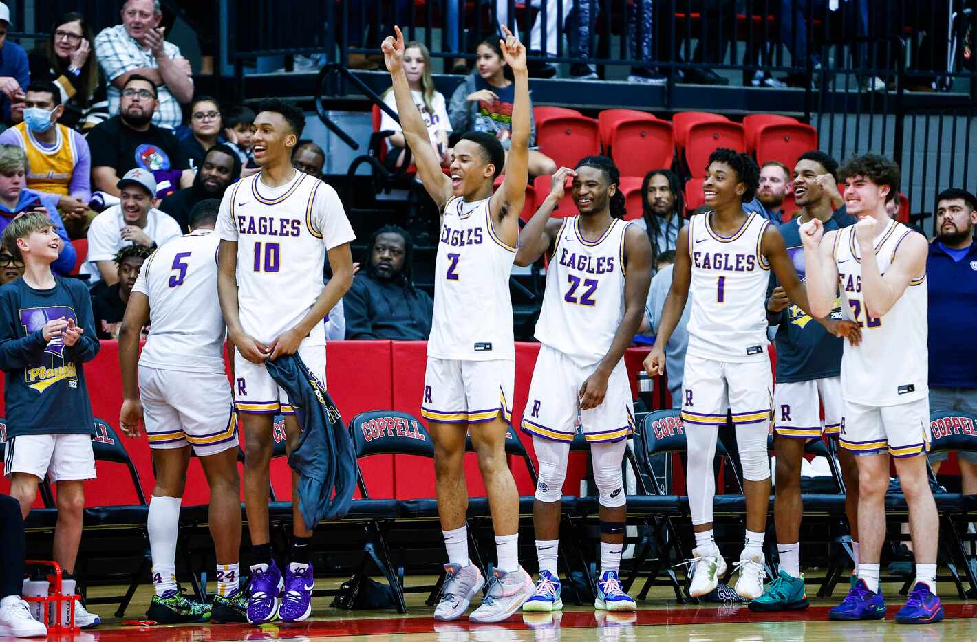 The Richardson varsity basketball team celebrate a 97-63 win over Grand Prairie after a boys...