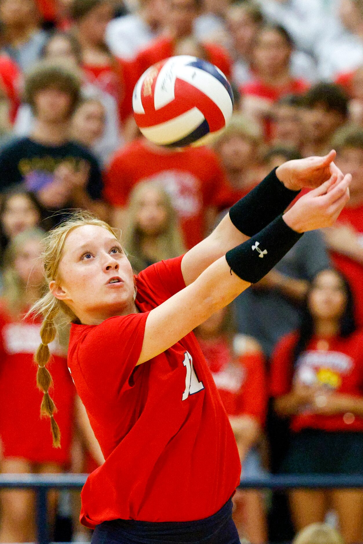 McKinney Boyd’s Ale Romo (11) passes the ball to a teammate during a volleyball match...