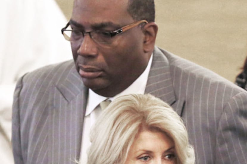 State Sens. Wendy Davis and Royce West attended the funeral mass for Dallas lawyer and civil...