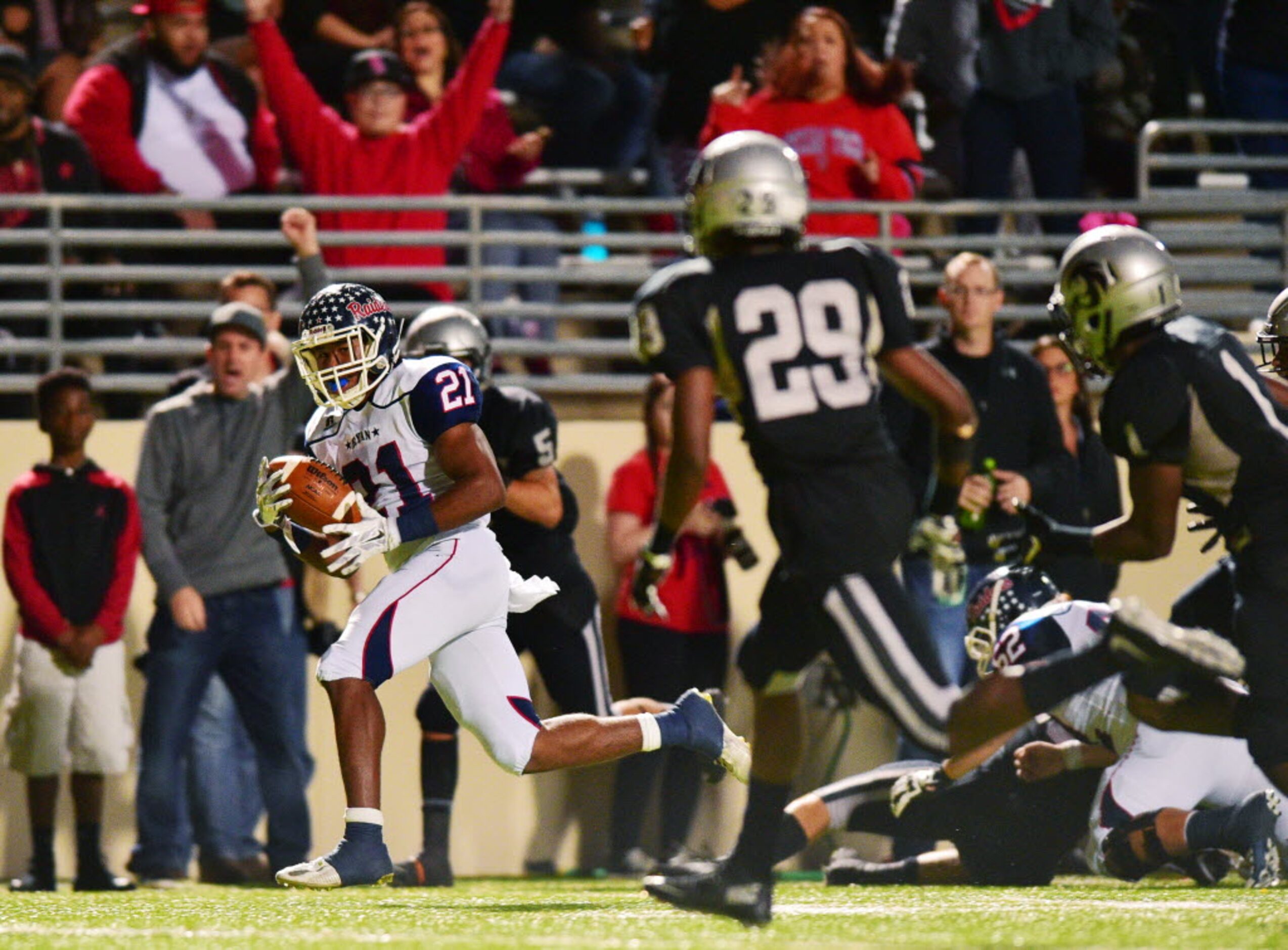 Ryan junior running back Tyreke Davis (21) finds room to run against Guyer, Friday, November...