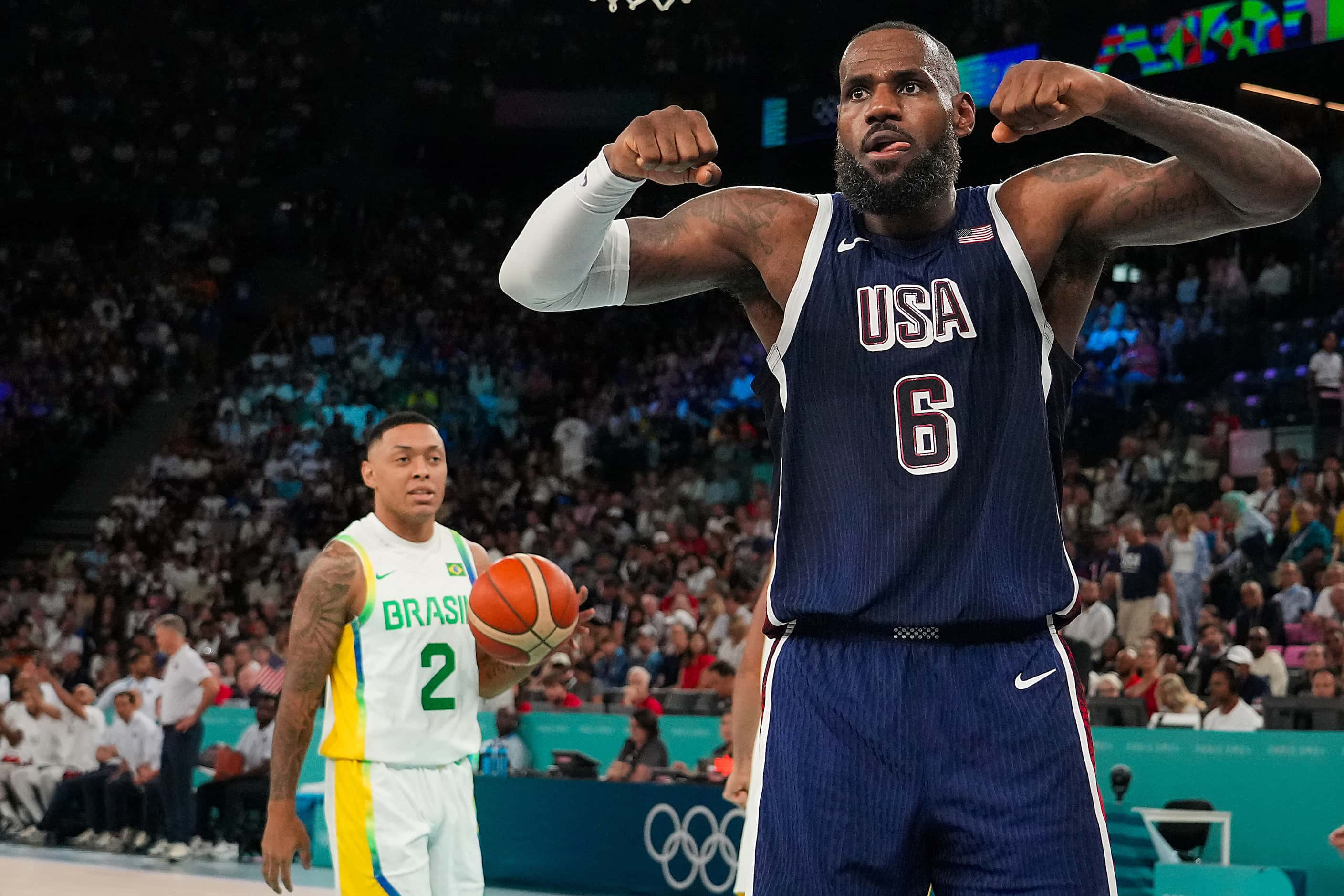 Lebron James (6) of the United States celebrates after a basket during a men’s basketball...