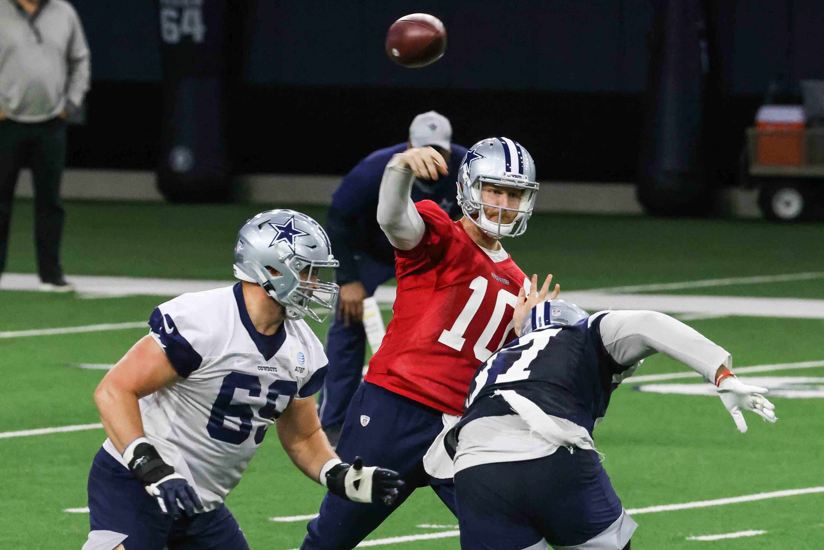 QB Cooper Rush, 10, during the Cowboys' full-squad offseason workouts at The Star in Frisco...