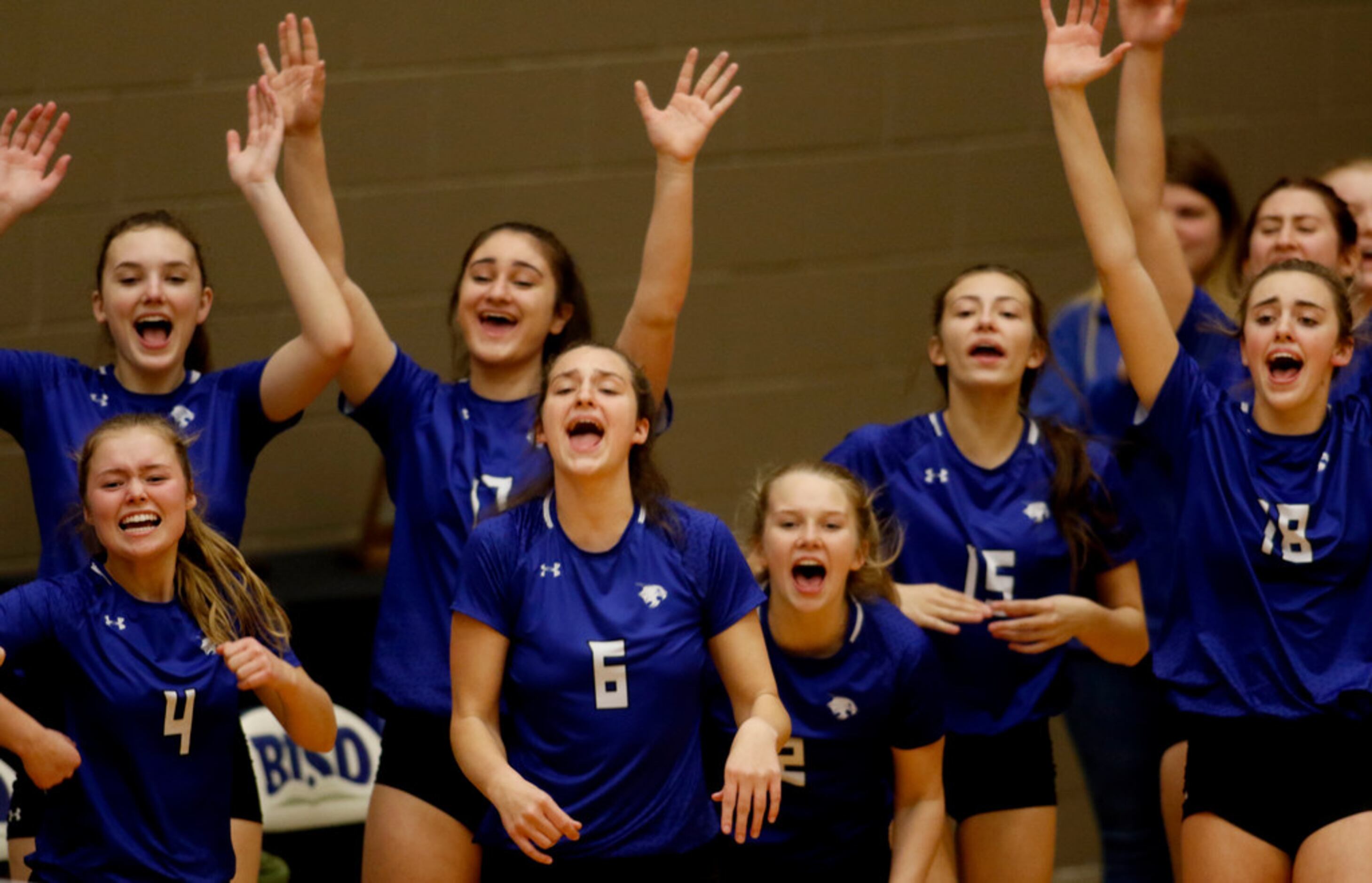 Euphoria prevails along the Trophy Club Byron Nelson bench area following a Lady Bobcats...