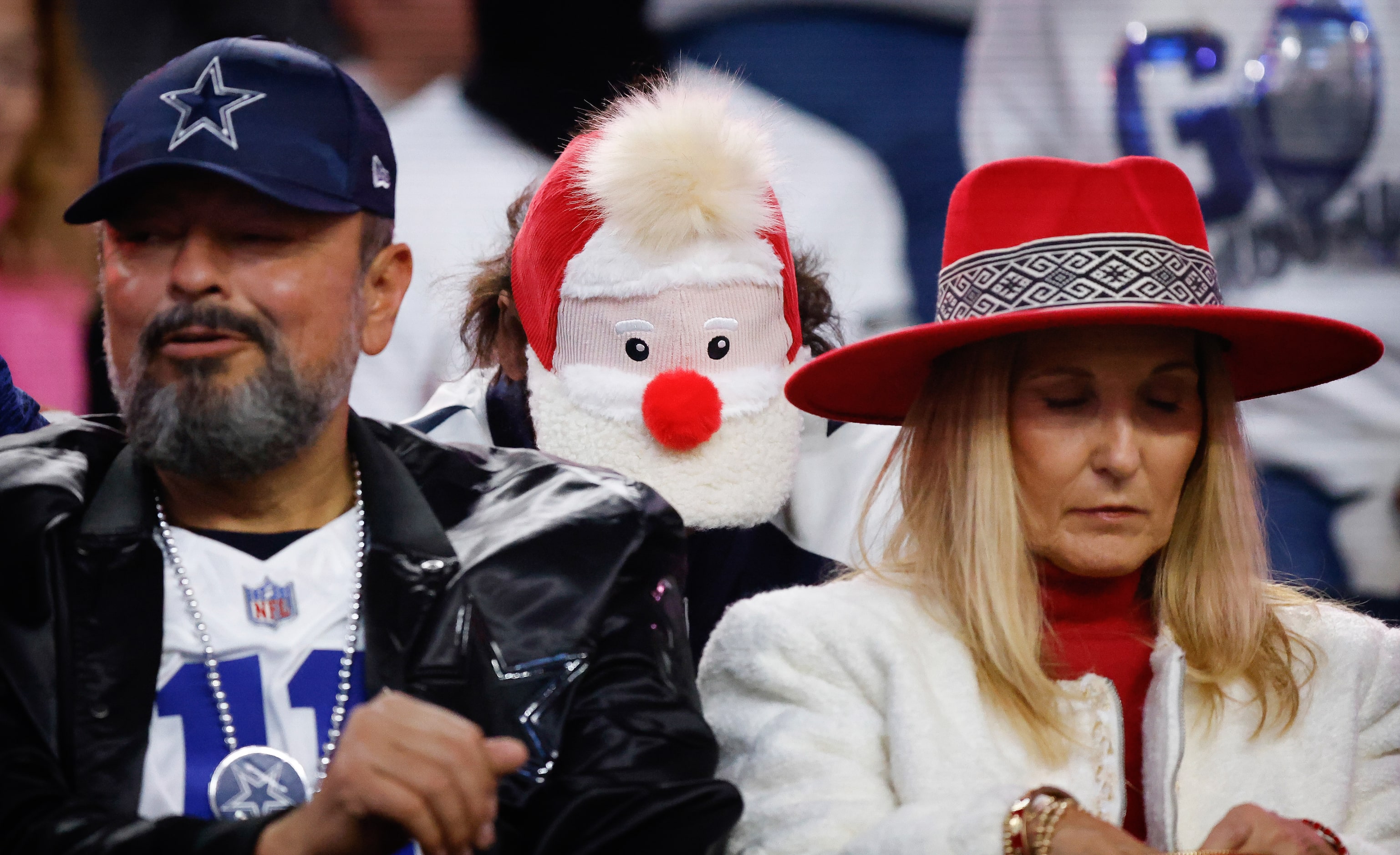 A Dallas Cowboys fan wore a Santa ball cap to the Tampa Bay Buccaneers game at AT&T Stadium...