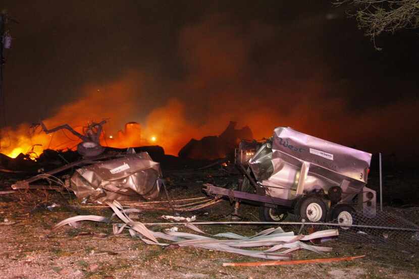 
A fire burns at a fertilizer plant in West, Texas after an explosion Wednesday April 17,...