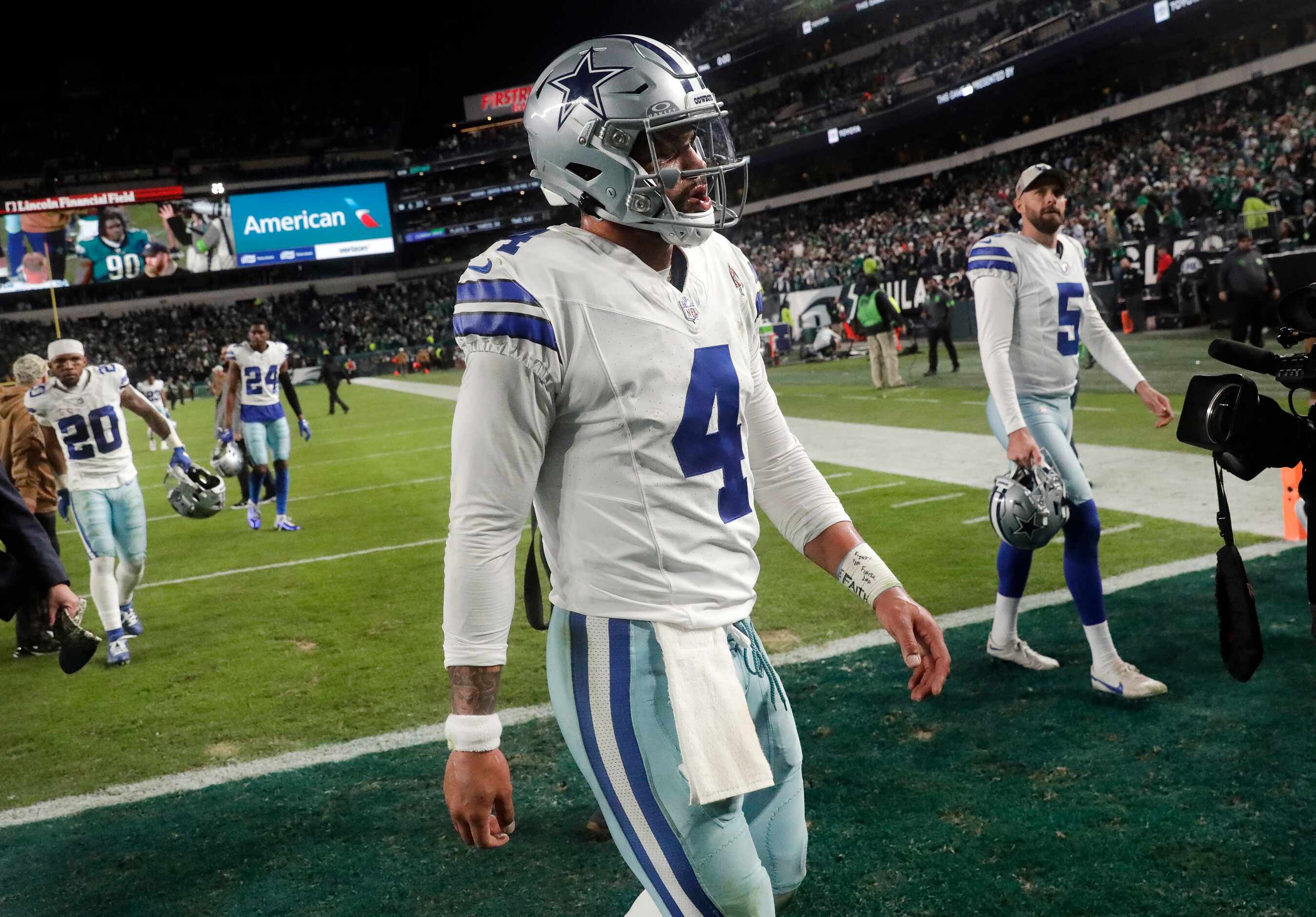 Dallas Cowboys quarterback Dak Prescott (4) walks off the field after their loss to the...
