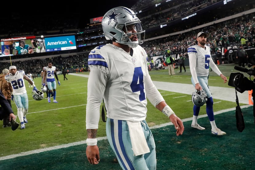 Dallas Cowboys quarterback Dak Prescott (4) walks off the field after their loss to the...