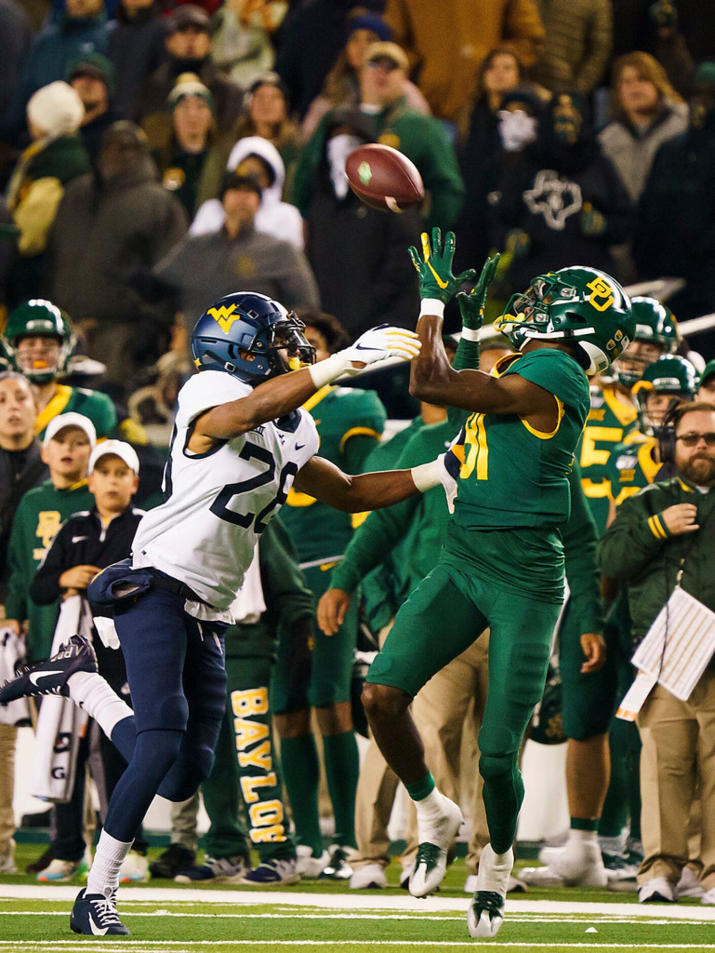 Baylor wide receiver Tyquan Thornton (81) hauls in 43-yard reception past West Virginia...