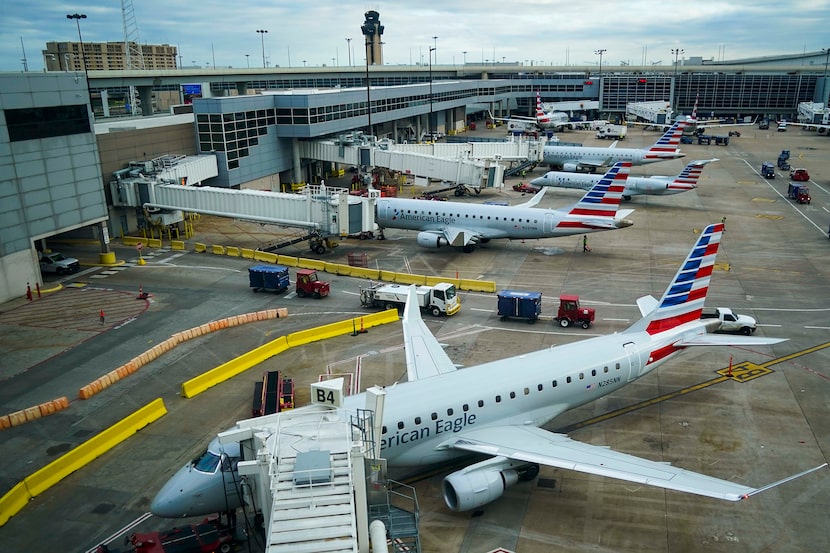 American Eagle planes parked at their gates at Dallas Fort Worth International Airport.