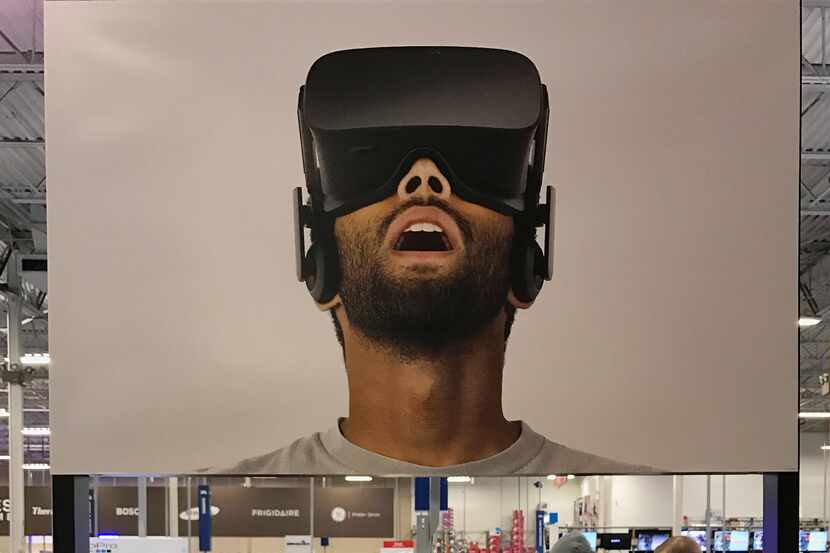 In this Jan. 3, 2017, photo a display for the new Oculus Rift virtual reality headset is...