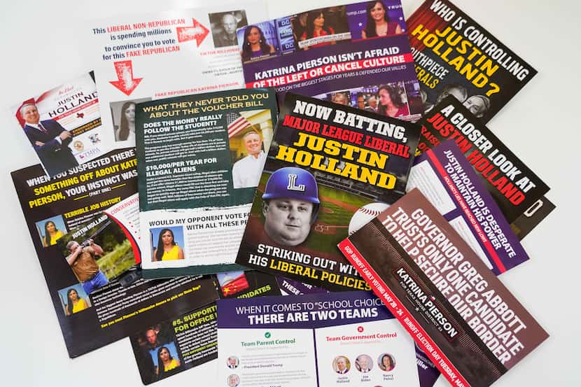 A collection of campaign mailers for candidates Justin Holland and Katrina Pierson, who are...