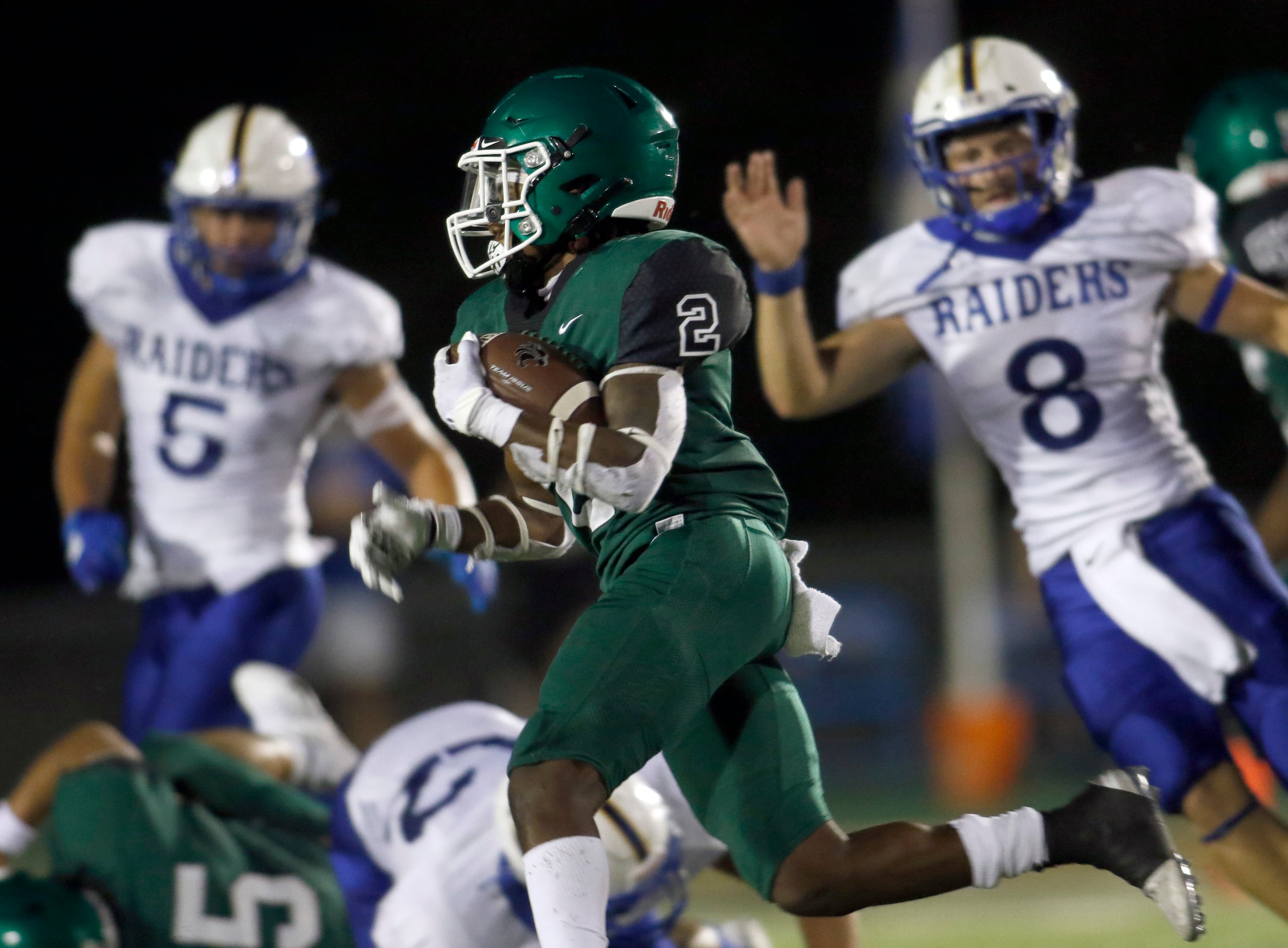 Kennedale running back Marlete Joyner (2) sprints away from the pursuit of the Sunnyvale...