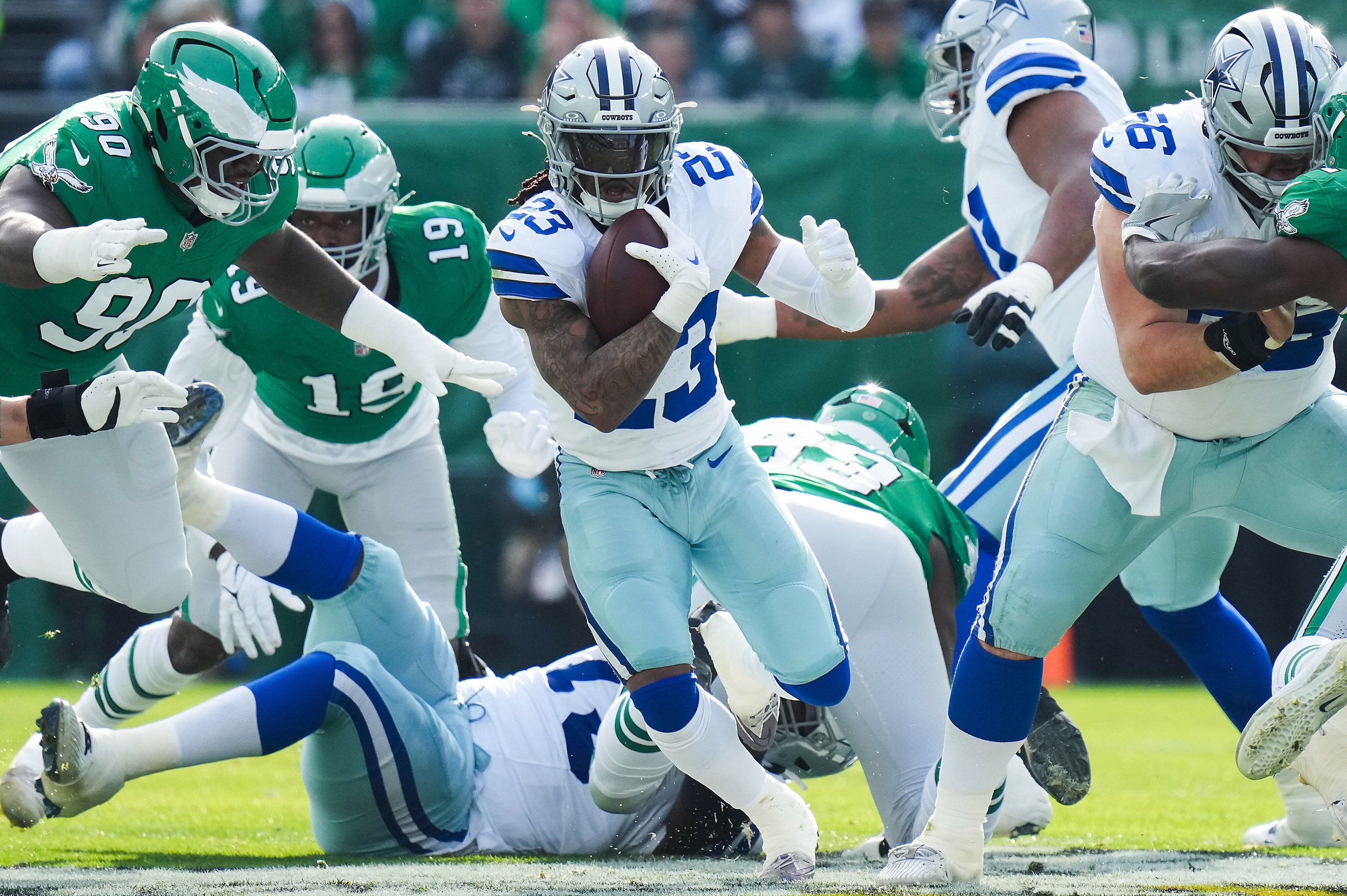 Dallas Cowboys running back Rico Dowdle (23) breaks through the Philadelphia Eagles defense...