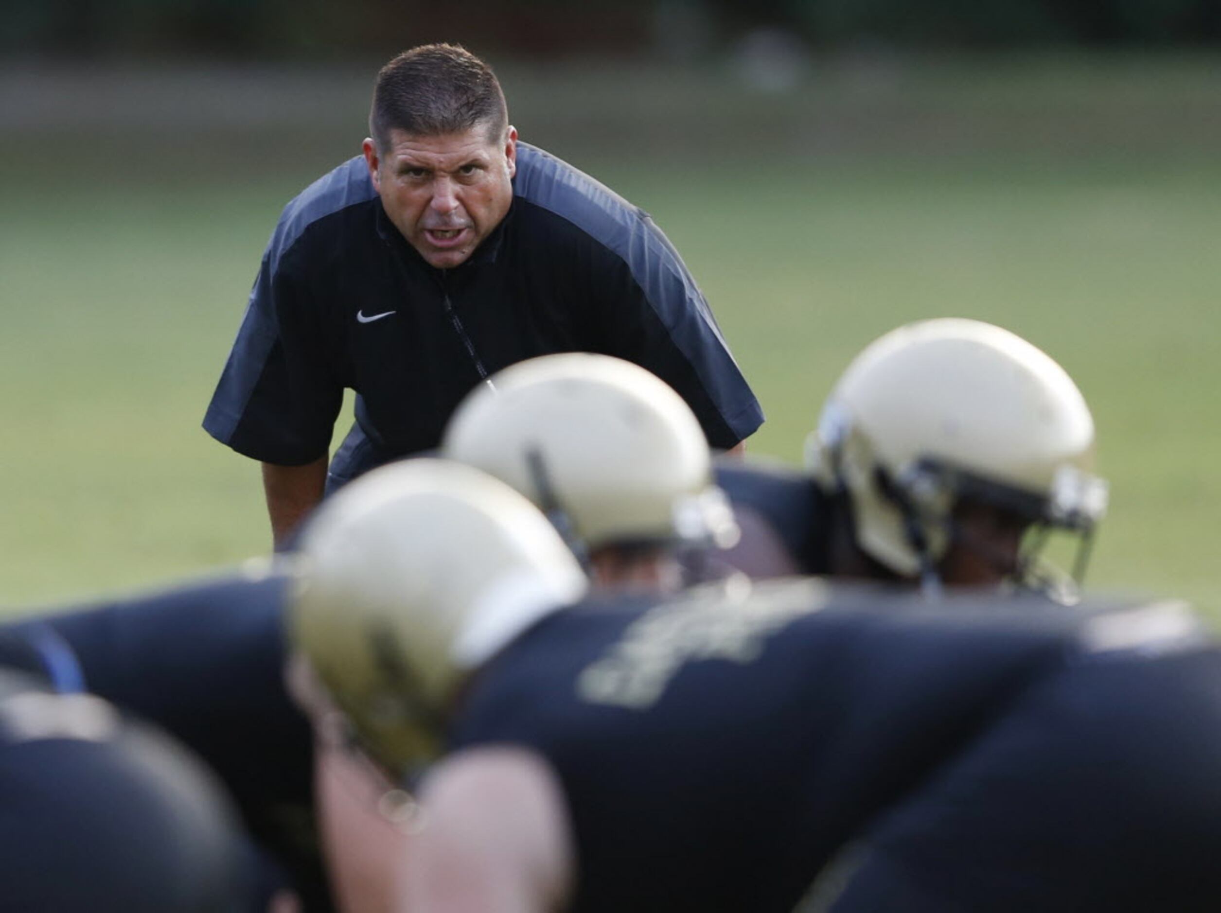 Plano East head coach Joey McCullough during the first day of football practice at Plano...