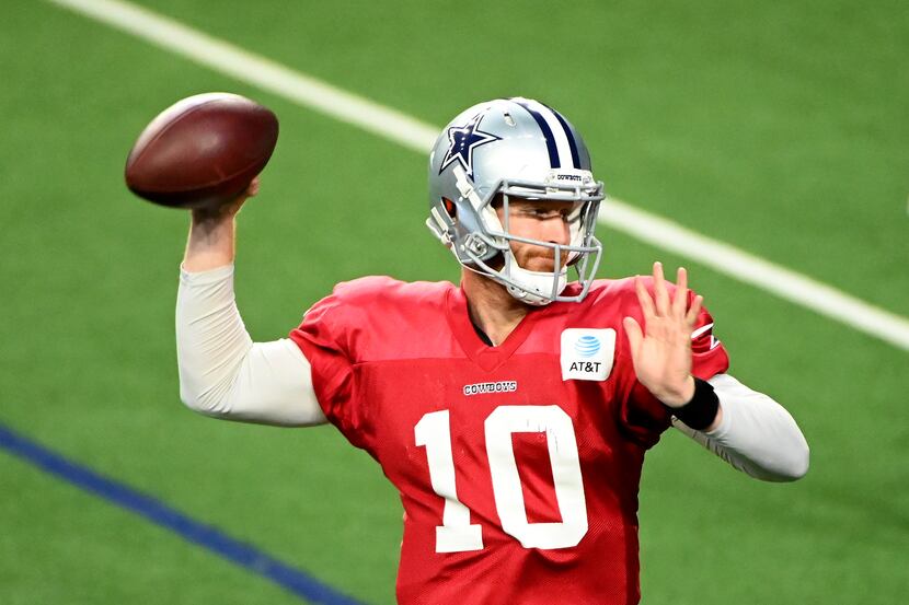 Dallas Cowboys quarterback Cooper Rush (10) throws during Dallas Cowboys football practice,...