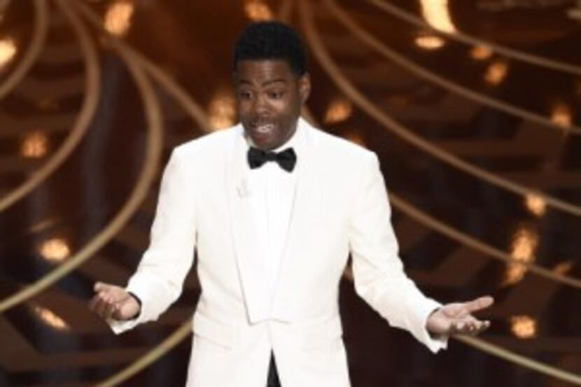  Host Chris Rock addressed the topic of racism in Hollywood head-on Sunday during the Oscars...