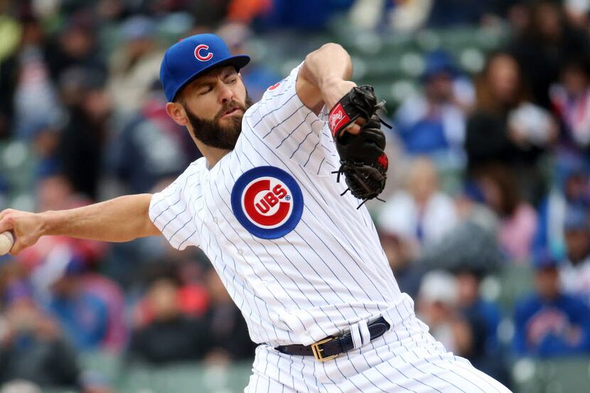 Chicago Cubs pitcher Jake Arrieta works against the Milwaukee Brewers in the first inning on...