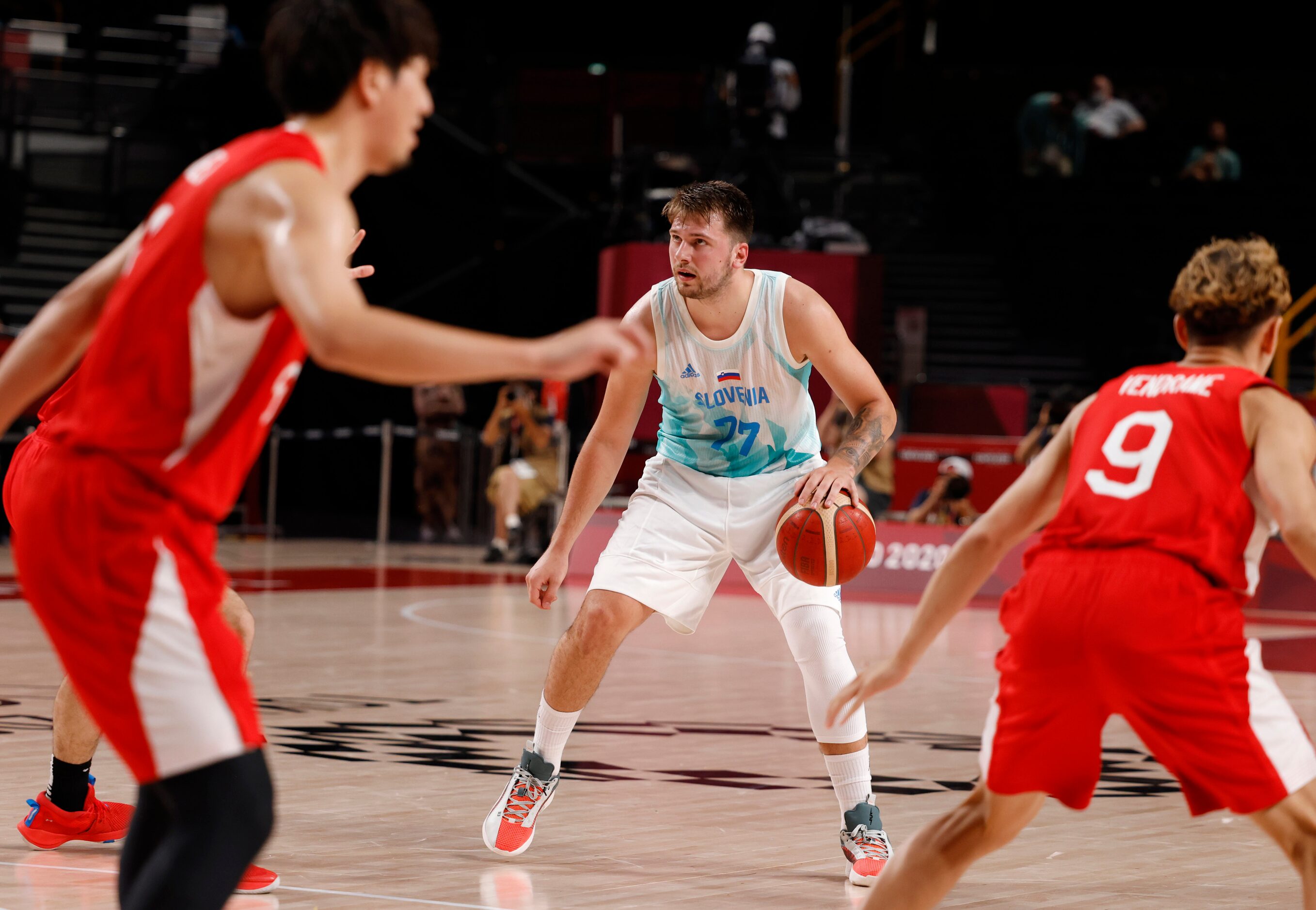 Slovenia’s Luka Doncic looks at the clock during the last seconds of the first half of a...