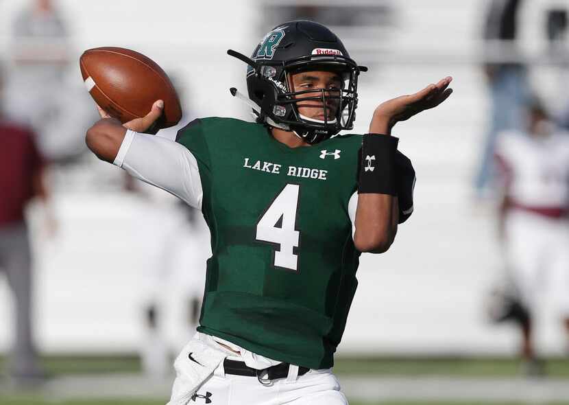 Mansfield Lake Ridge senior quarterback Chandler Rogers (4) throws during the first half of...