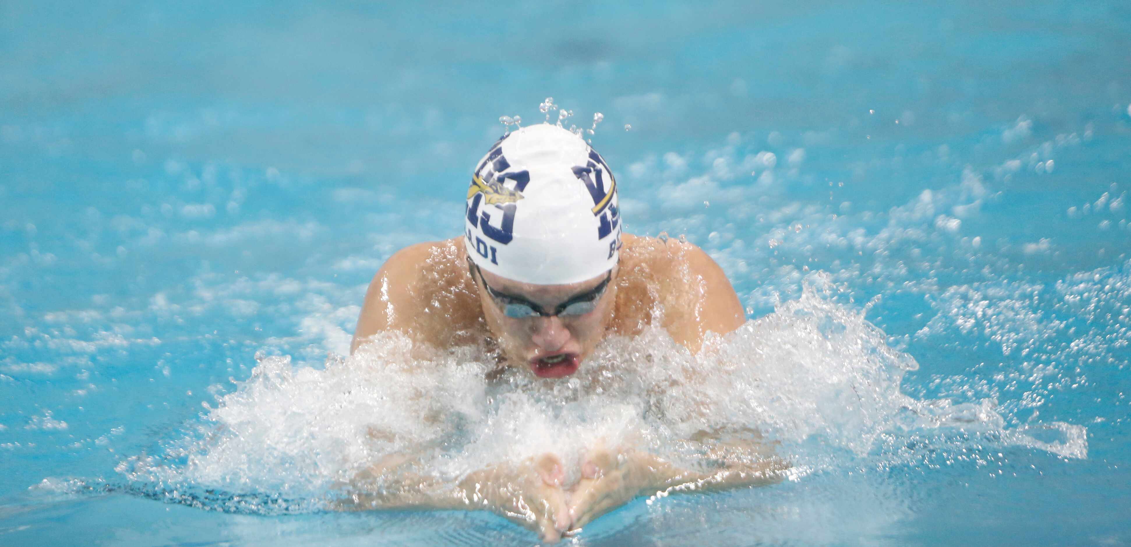 Keller swimmer Branden Beladi competes in the 6A Boys 100 Yard Breaststroke event. The first...