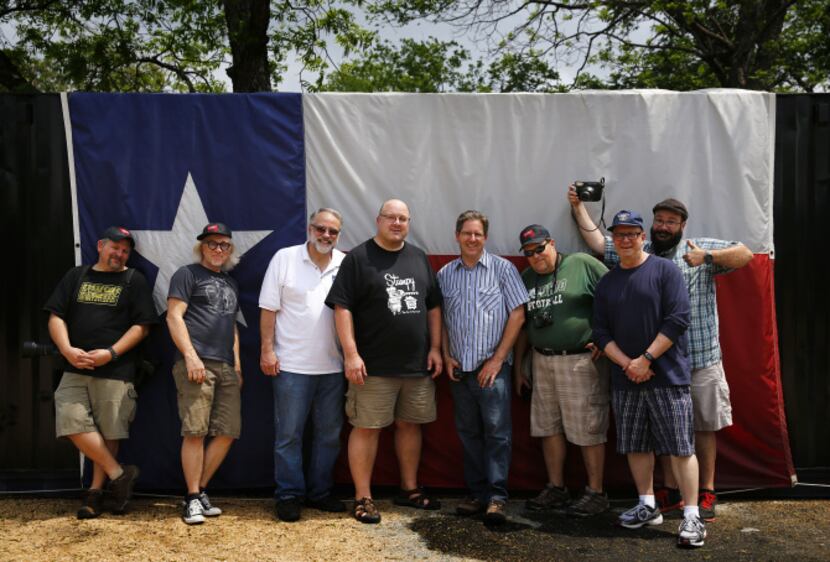 The Texas BBQ Posse poses for a photo at John Mueller Meat Co. during the Austin BBQ Tour....