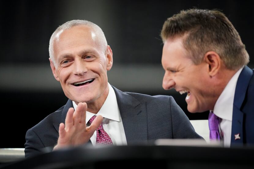 Incoming Big 12 commissioner Brett Yormark laughs while being interviewed by ESPN during the...