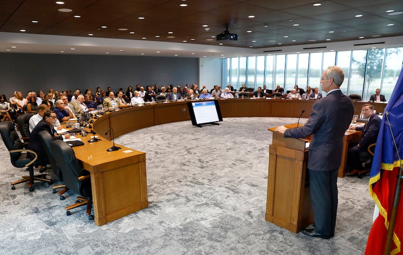 Richardson homeowner Ken Hutchenrider speaks during the public comments portion of...