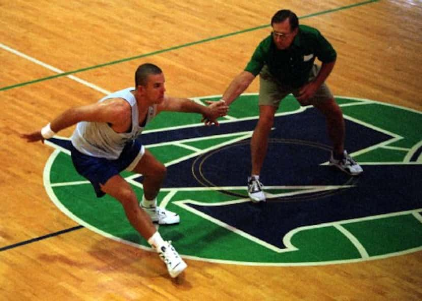 ..Jason Kidd runs through drills new coach Dick Motta during the first day of Mavericks...