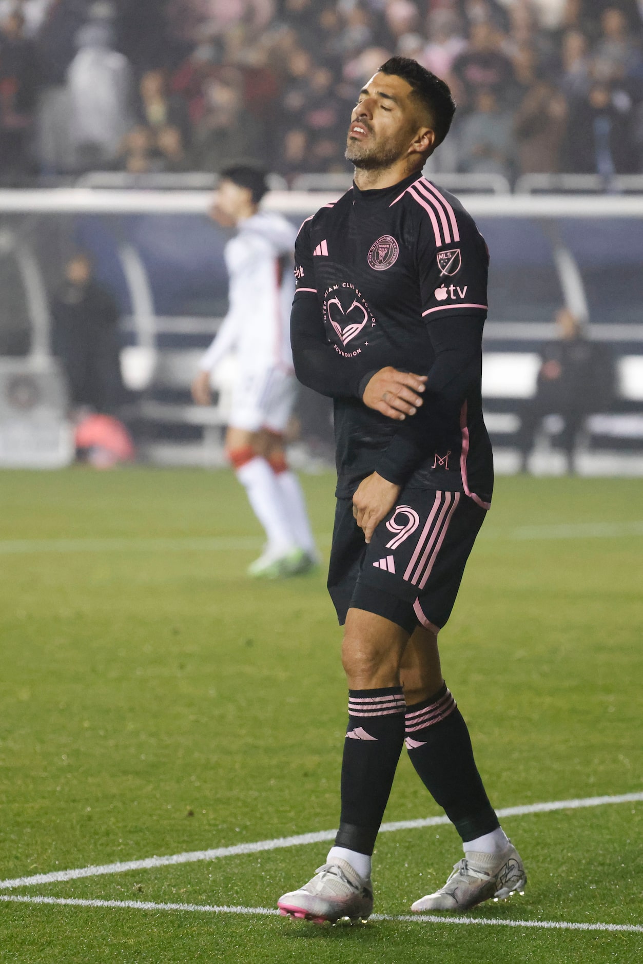 Inter Miami forward Luis Suárez reacts after missing a goal during the second half of a...