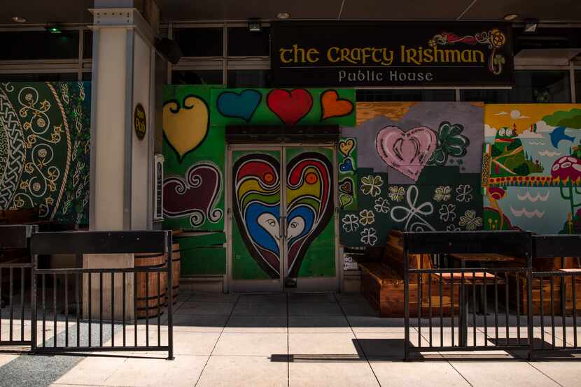 The Crafty Irishman restaurant on Main Street in downtown Dallas is boarded up and...