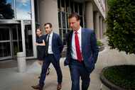 Dr. Eithan Haim, left, and his attorney, Ryan Patrick, right, leave federal court after...