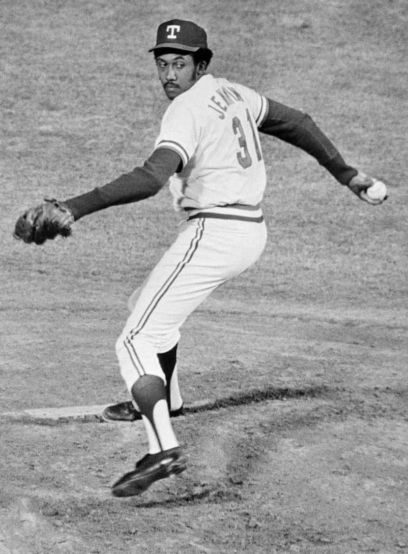 Texas Rangers pitcher Ferguson Jenkins winds up to let fly as he pitched a one hitter in his...
