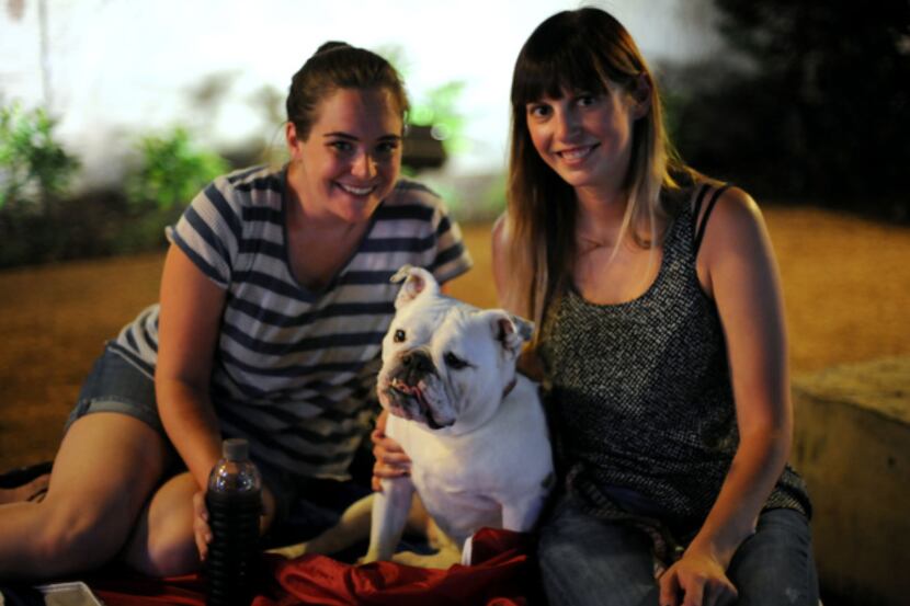 Jamie Clintsman, Megan Spooner and 6-year-old bulldog Lulu attended last week's screening of...
