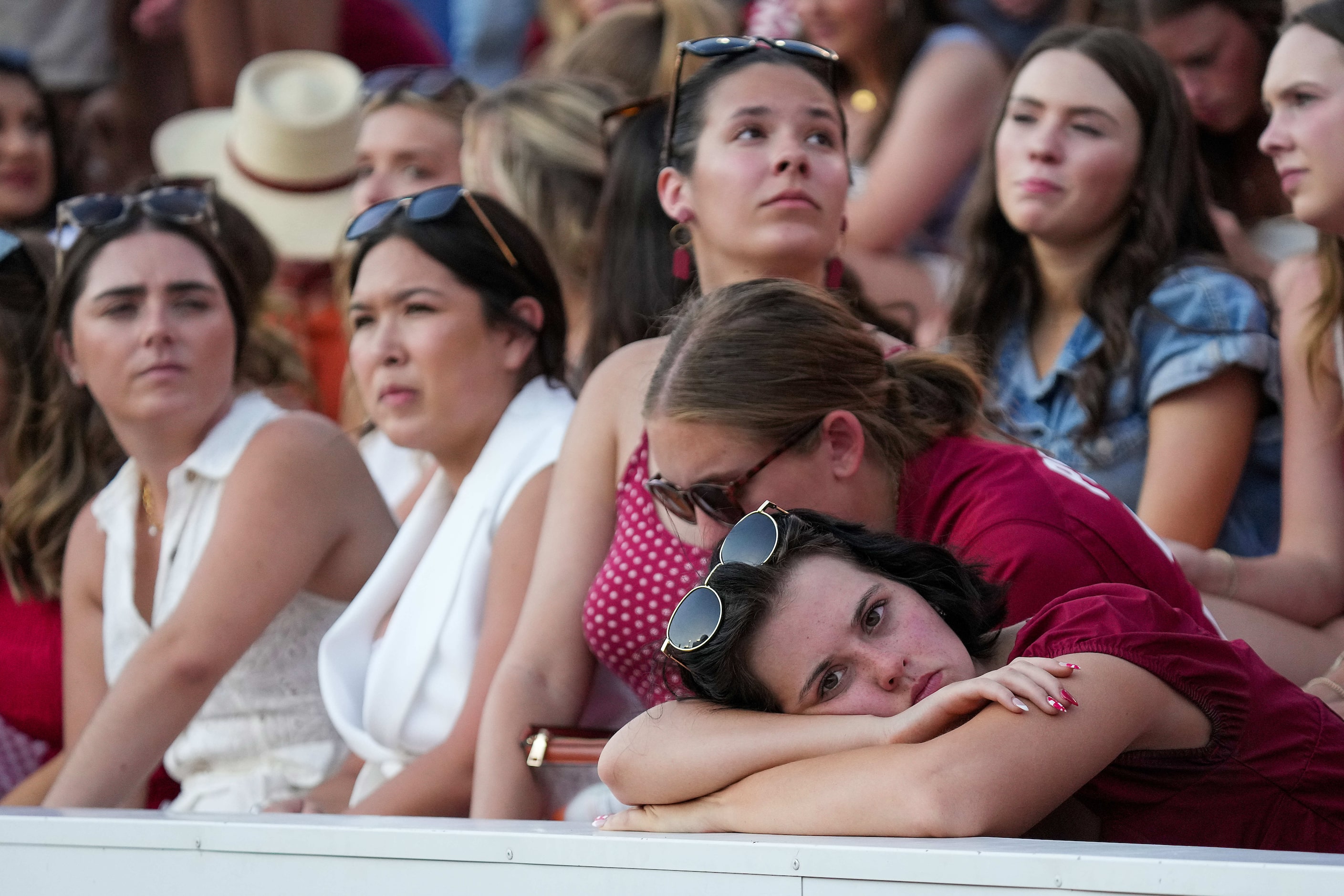 Oklahoma fans watch during the second half of an NCAA college football game against Texas at...