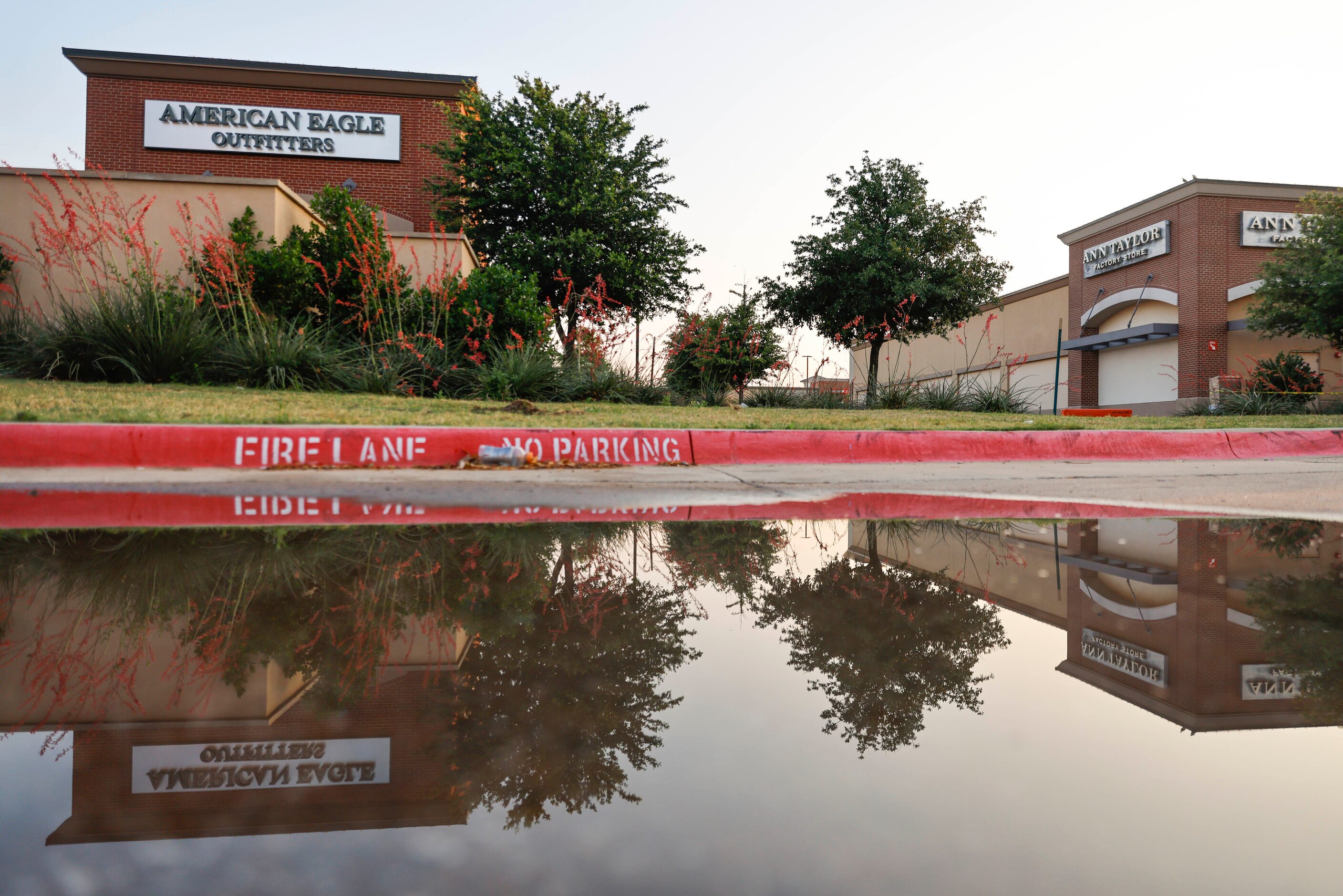 Former memorial site outside of the Allen Premium Outlets mall on the day of the reopening...