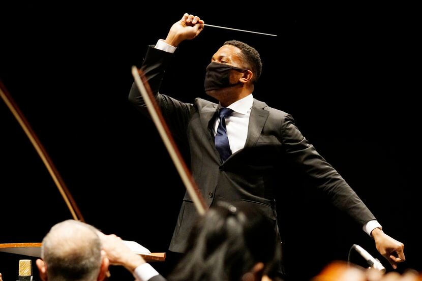Conductor Roderick Cox leads the Fort Worth Symphony Orchestra at Will Rogers Auditorium in...