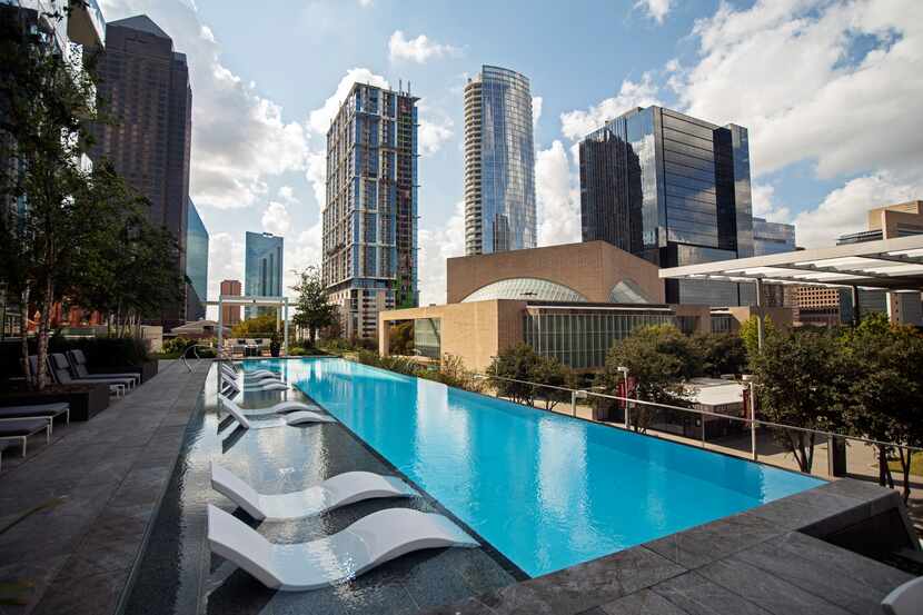 The Hall Arts Residences' infinity edge lap pool with views of the Arts District and...