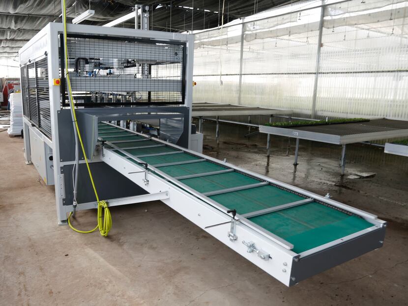 The new Visser Horti Systems AutoStix robot automates the planting process up to 10,000...