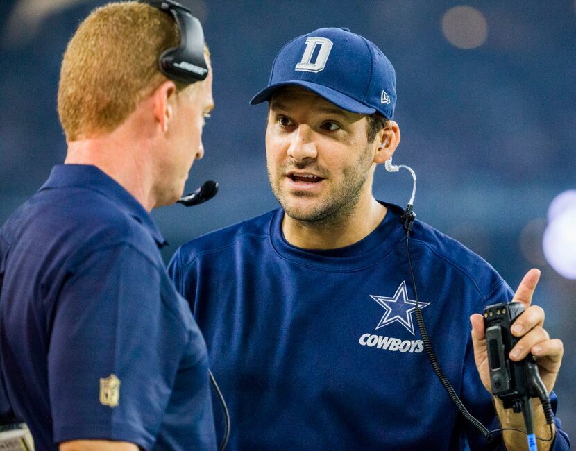 Injured Dallas Cowboys quarterback Tony Romo (9) talks to Dallas Cowboys head coach Jason...