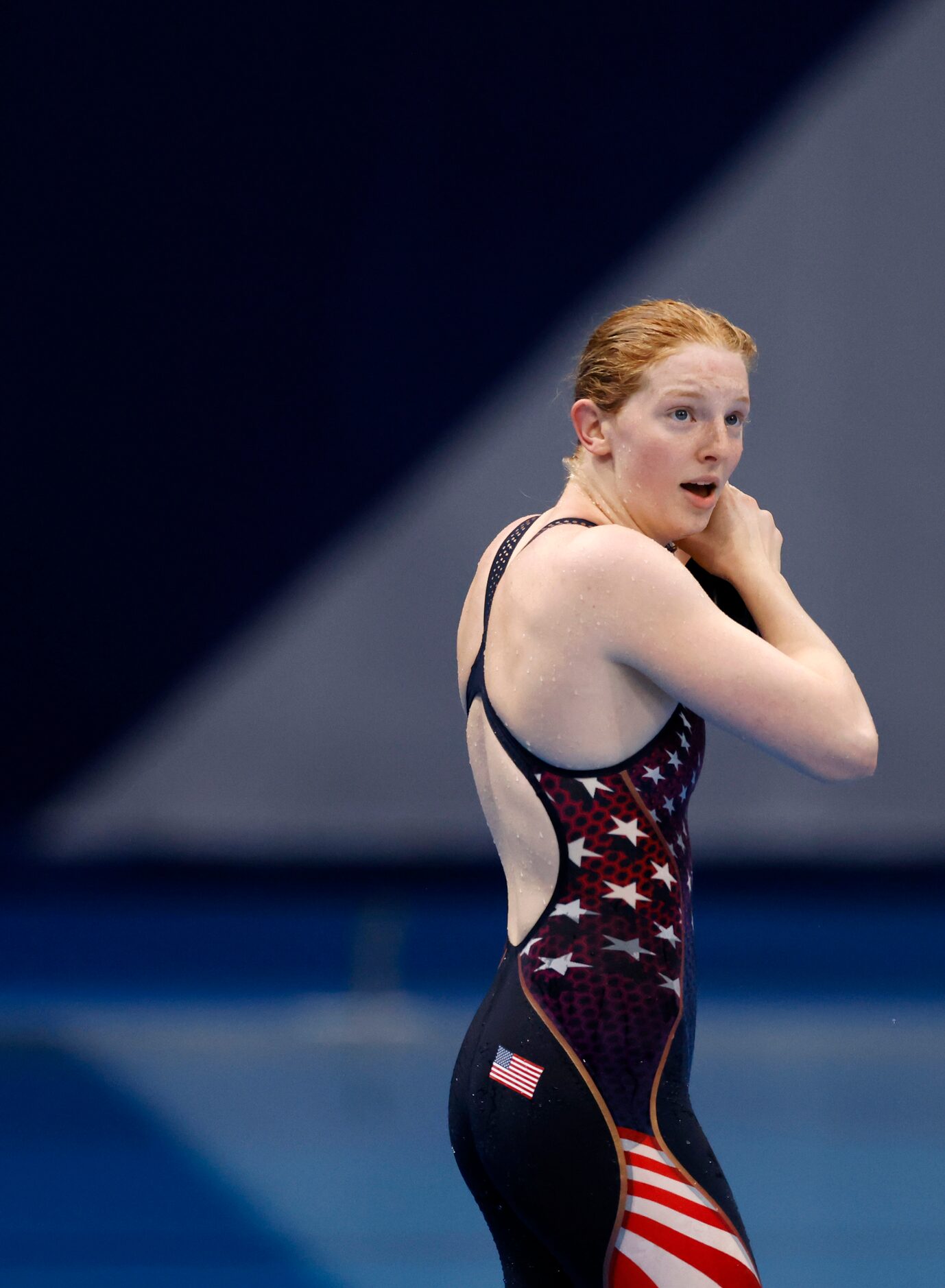 USA’s Lydia Jacoby makes her way towards the exit after competing in the women’s 100 meter...