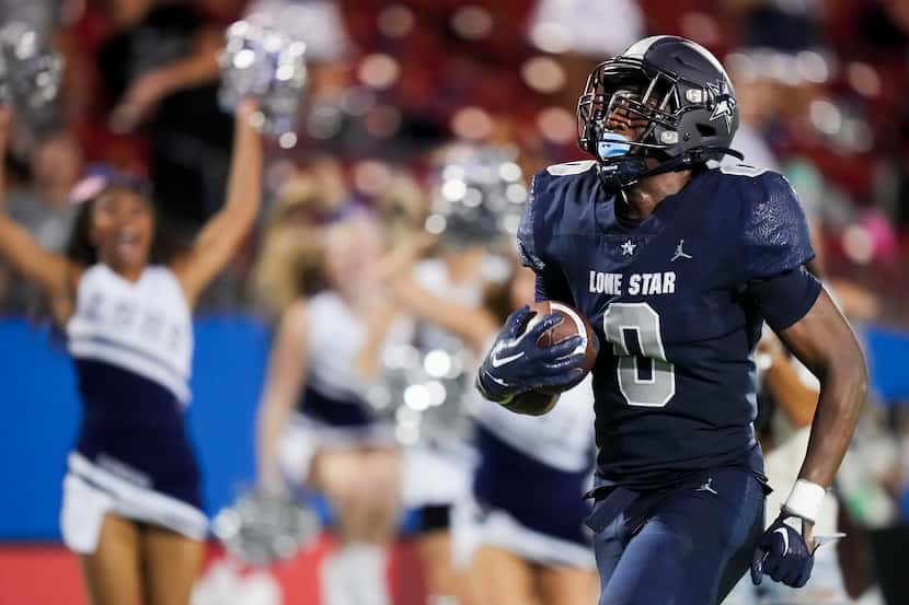 Frisco Lone Star running back Davian Groce (0) races down the sidelines on 37-yard touchdown...