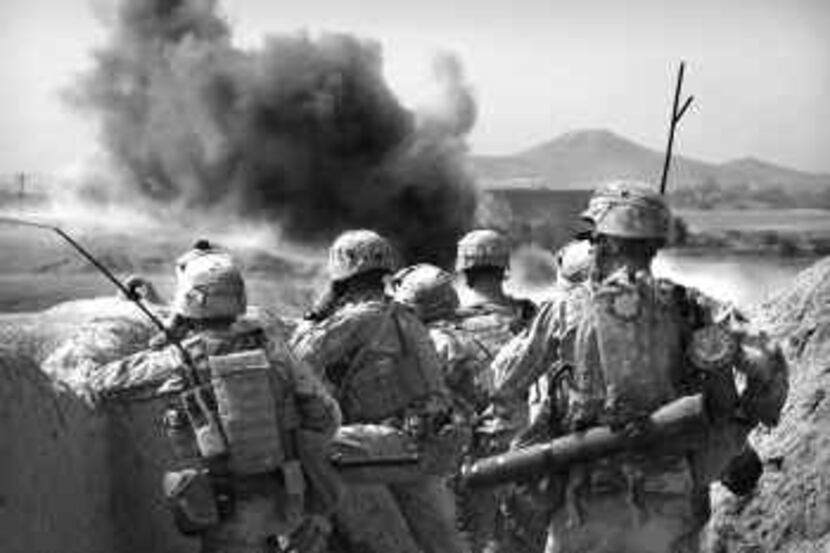 Marines battle insurgents in the Helmand province of Afghanistan. With the buildup of 30,000...
