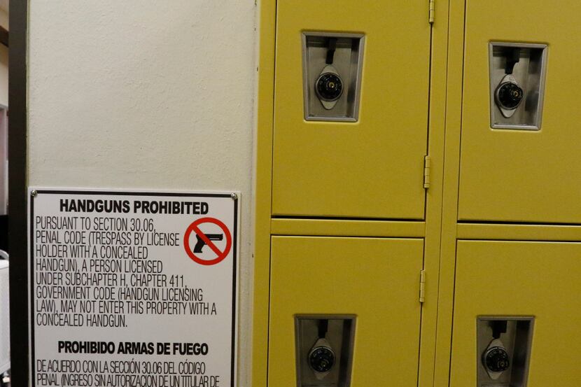 A sign warns that firearms are prohibited at Dr. Wright L. Lassiter Jr. Early College High...