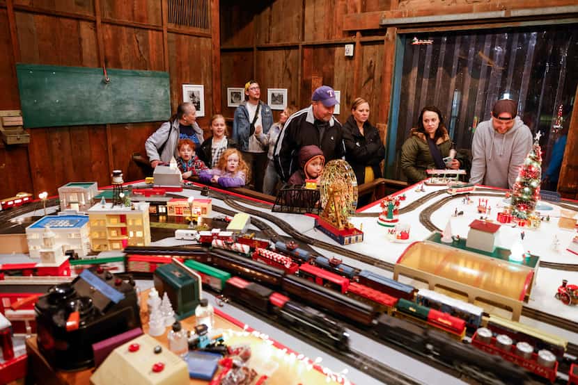 Visitors to Old City Park during Candlelight 2022 enjoyed the vintage toy train exhibition...