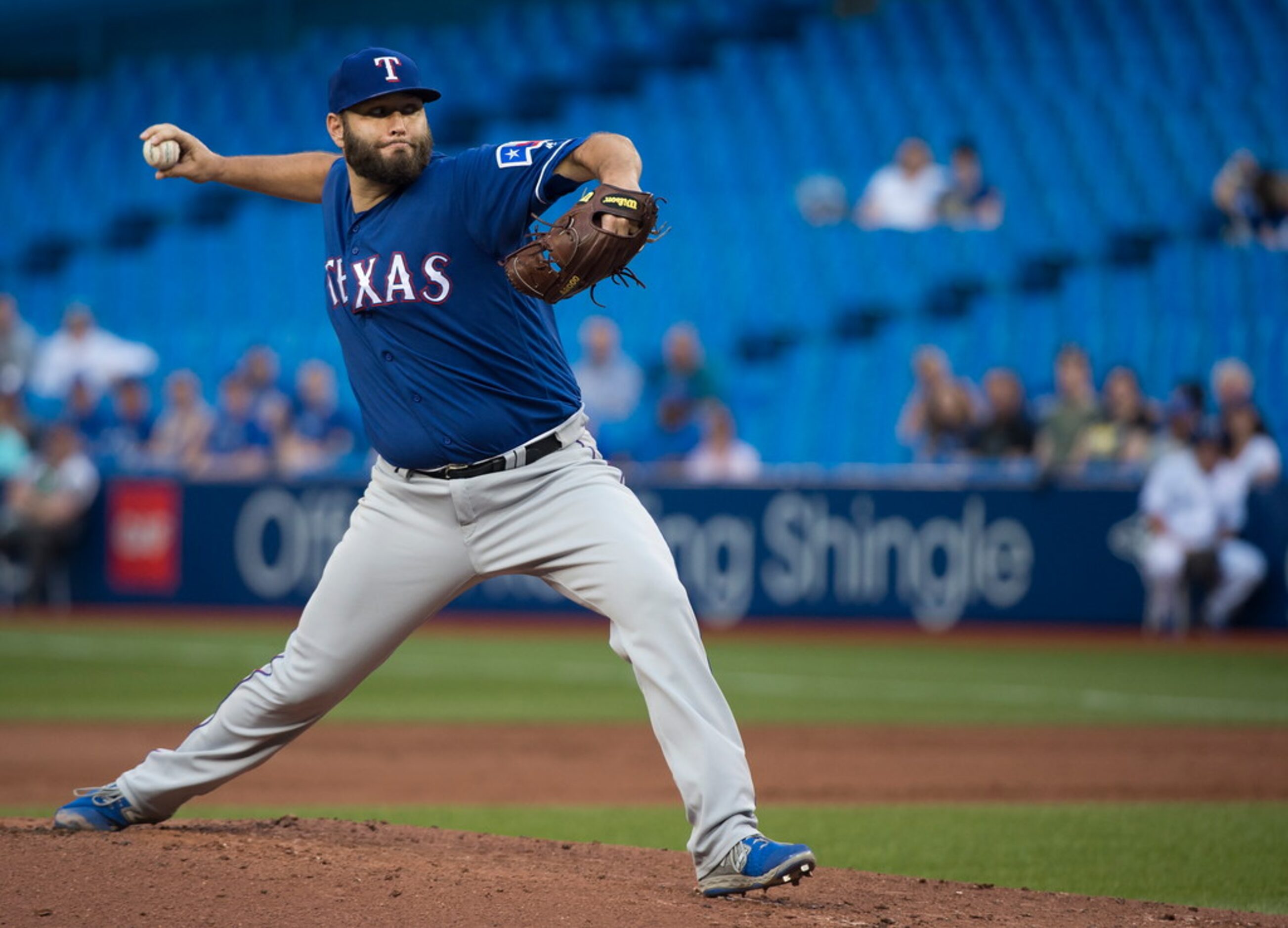 Texas Rangers starting pitcher Lance Lynn (35) works against the Toronto Blue Jays during...