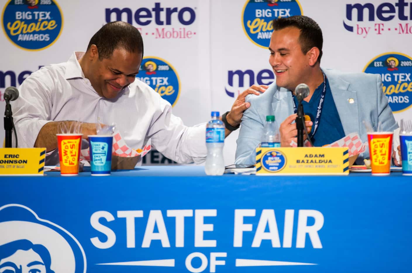 Adam Bazaldua, seen here with Mayor Eric Johnson taste-testing State Fair food last month,...