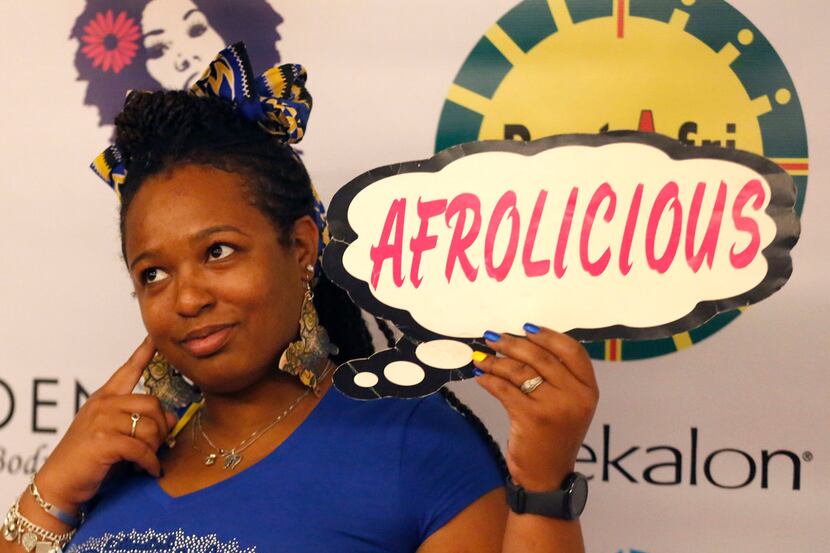 Alma Jones-Mayes poses for a photo for a friend during the Afrolicious Hair and Beauty Expo...